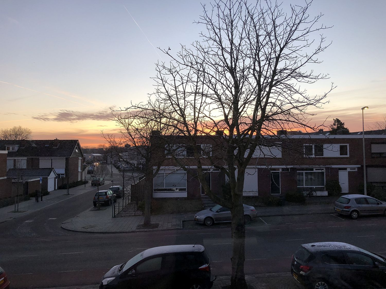 Sonnenaufgang über den Nachbarhäusern